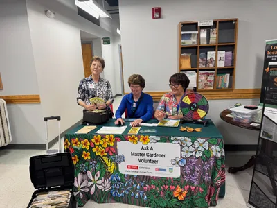 Custom Rectangle Table Covers - This was an event to train our Durham County NC Extension Master Gardeners how to work at community public events The tablecloths are beautiful and have been a total hit with the team