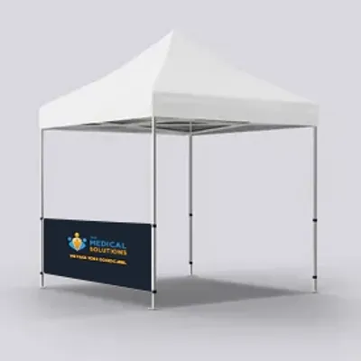 A promotional event tent with a custom printed banner that reads 'MEDICAL SOLUTIONS Partnering With Doctors.'